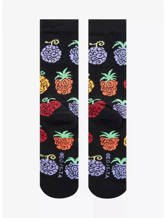 Black One Piece Devil Fruit Allover Print Crew Socks with colorful pineapple pattern on a white background