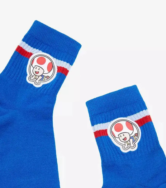 Pair of blue socks with red accents and a logo on a white background