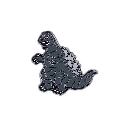 Gray Godzilla enamel pin on a white background