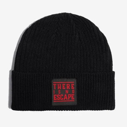 A black Star wars ribbed knit beanie hat featuring a red and black circular Star Wars Galactic Empire crest patch on the front cuff, with a small white embroidered logo on the side, shown against a light gray background.