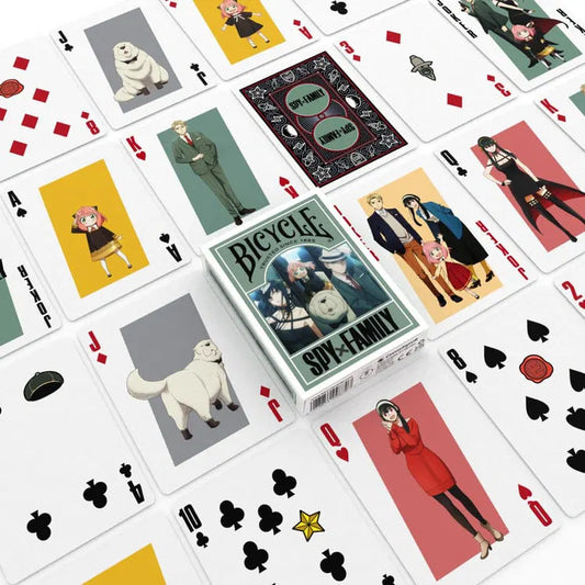 Playing cards with character illustrations and a box labeled 'Bicycle Spy Family' on a white background.