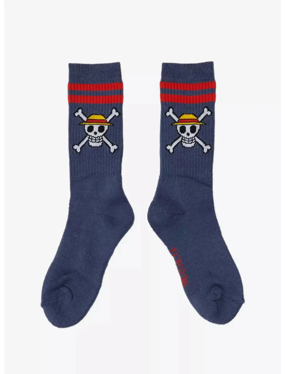 Pair of navy blue One Piece straw hat crew socks with skull and crossbones design on a white background