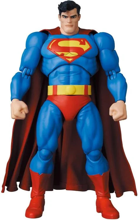 Superman action figure with blue suit, red cape, and yellow belt on a white background. MAFEX No.161 Superman Batman: The Dark Knight Returns available at chimploot.com