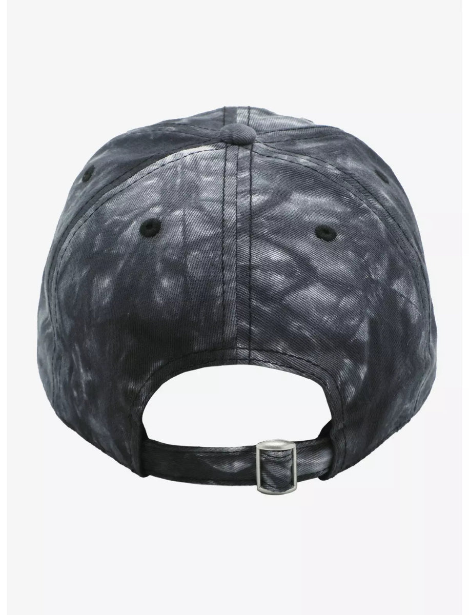 Black tie-dye cap with a cartoon character of 'Muffin' from the show Bluey on a white background