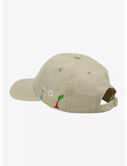 A beige baseball cap featuring embroidered Pikmin characters on the front panel, set against a plain white background.