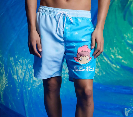 Person wearing Studio Ghibli Ponyo blue Split Swim Trunks with a cartoon character design on a blue background