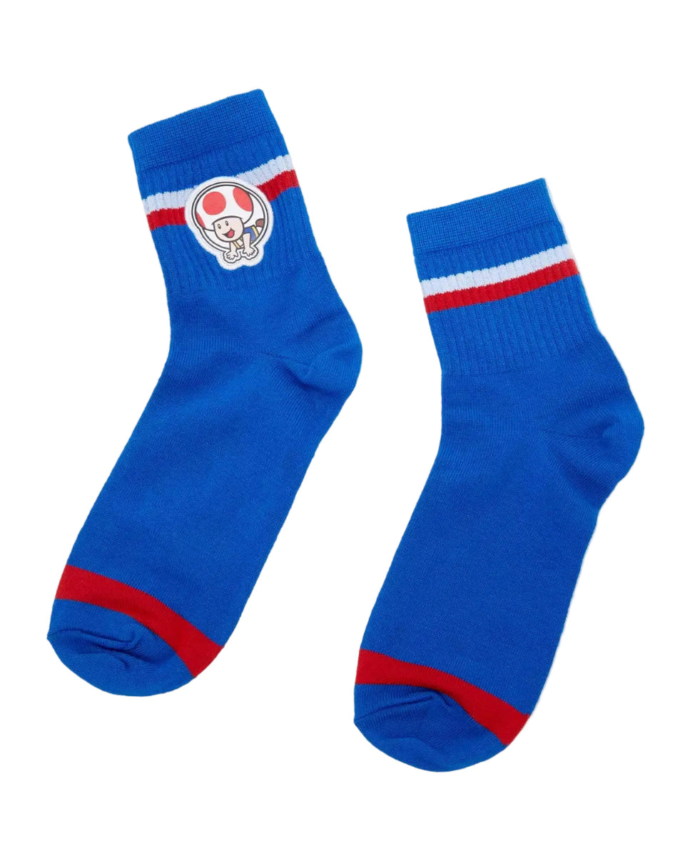 Pair of blue socks with Super Mario Bros. Toad red accents on a white background