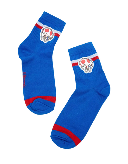 Pair of blue socks with Super Mario Bros. Toad red accents on a white background