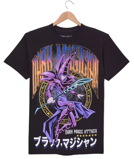A black short-sleeve graphic t-shirt hanging on a wooden hanger against a light gray background. The shirt features a large front print of the Yu-Gi-Oh! character Dark Magic Attack, with purple, orange, and blue details, and Japanese text at the bottom.
