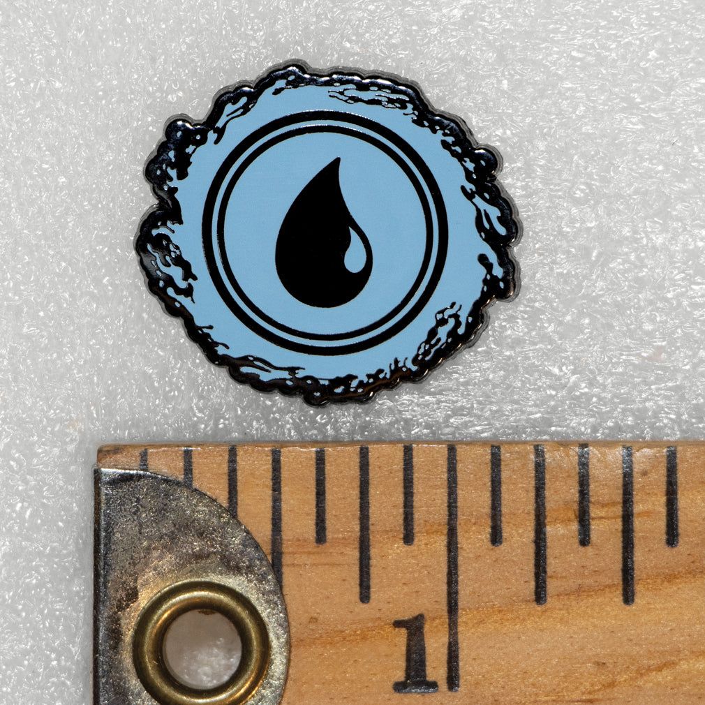 Enamel pin with 'Magic: The Gathering' water mana logo available for sale at chimploot.com