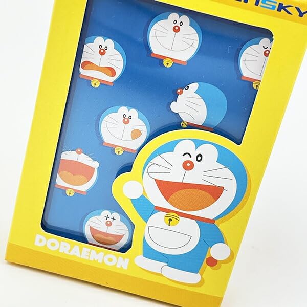 A Doraemon-themed phone case in its yellow packaging, featuring a blue background with multiple cartoon illustrations of Doraemon and a large character graphic on the front.
