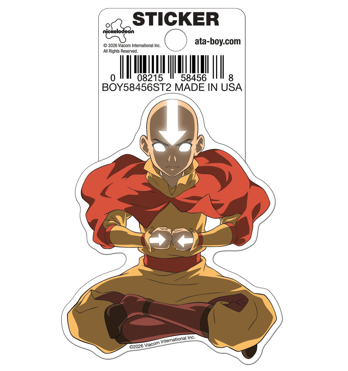 A die-cut sticker of the character Aang from Avatar: The Last Airbender, shown on its original retail backing card. The sticker depicts Aang meditating in a red robe and tan pants, with his forehead marked in white.