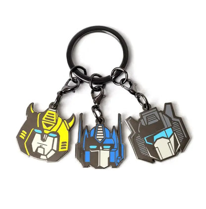 Keychain with three Transformers autobot robot head designs on a white background