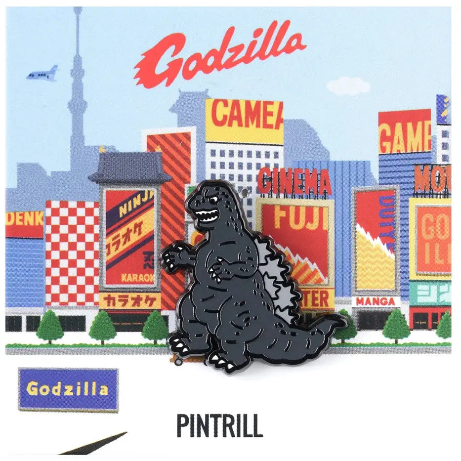 Godzilla pin with a cityscape background featuring various signs and buildings.