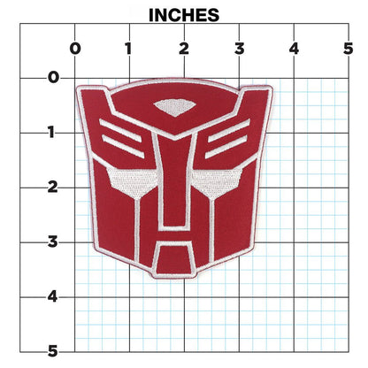 Transformers autobot iron-on patch with red and white emblem on a black background available at chimploot.com