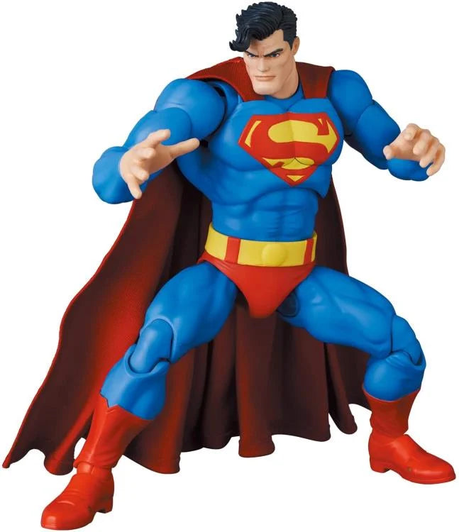 Superman action figure with blue suit, red cape, and yellow belt on a white background. MAFEX No.161 Superman Batman: The Dark Knight Returns available at chimploot.com