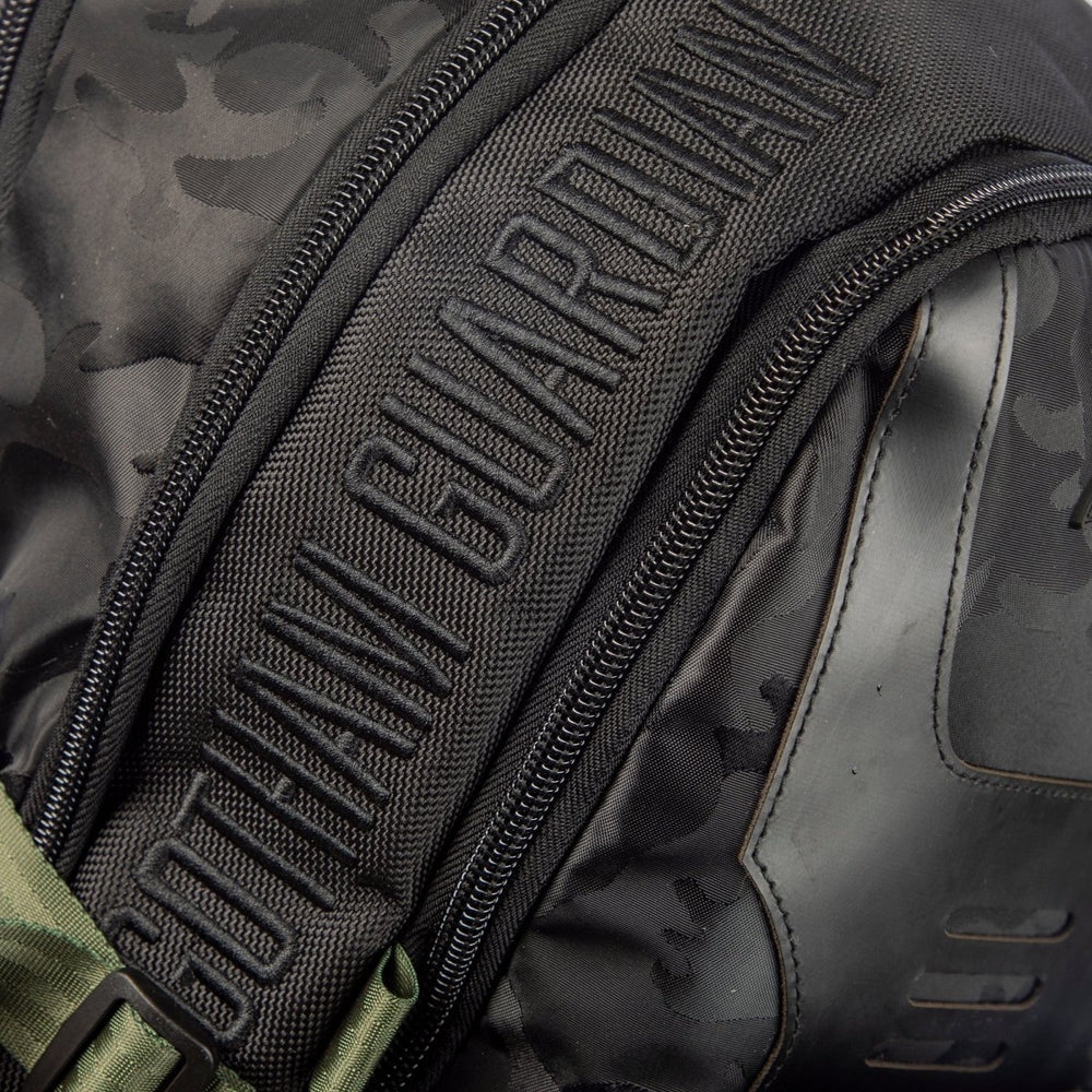 Black and green DC Comics Batman Tactical Black Backpack with bat emblem on a white background