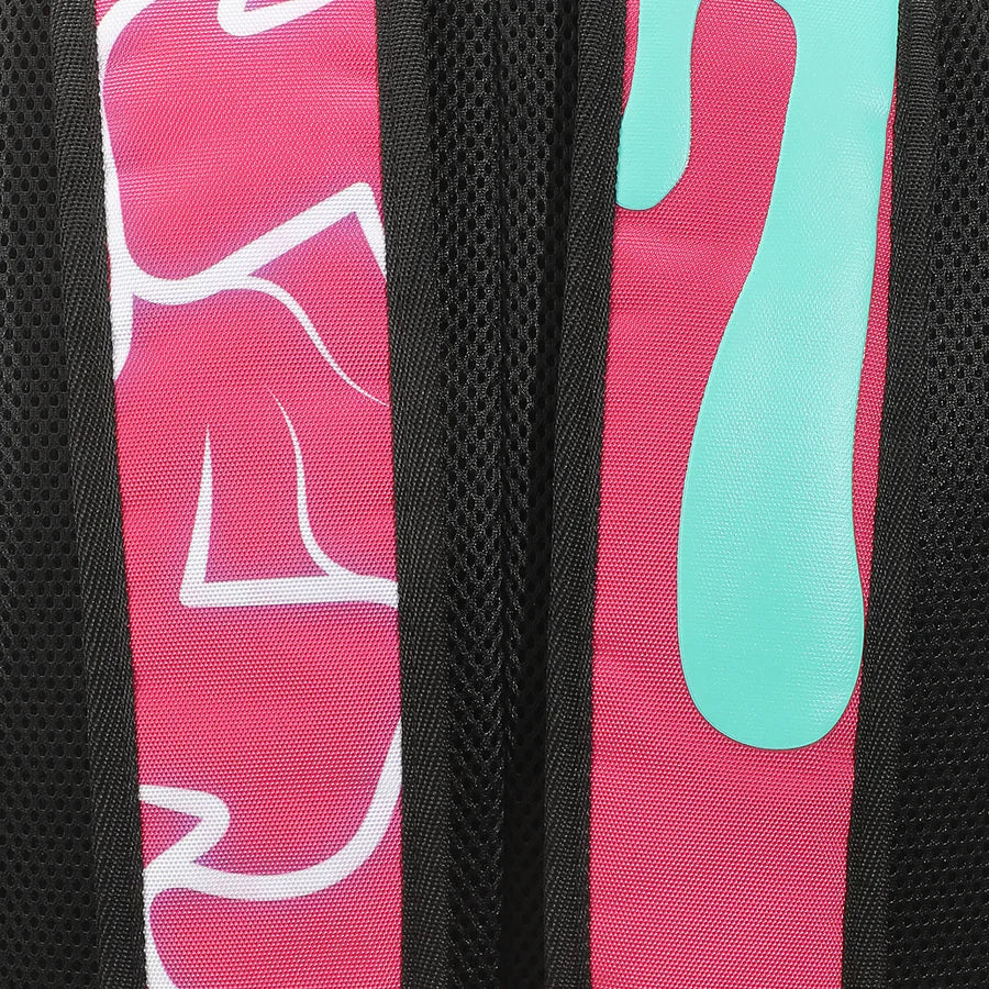 Backpack with a graphic design Godzilla and text on a pink and black background