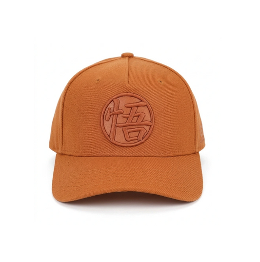 Orange Dragon Ball Z Goku's Symbol cap with a logo on a white background