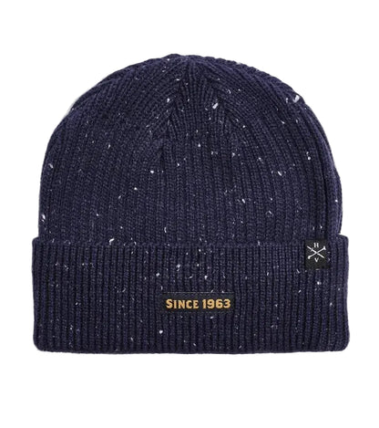 A navy blue knit x-men beanie with white speckles, featuring a black embroidered patch on the front cuff that reads 'XAVIER INSTITUTE' with a gold cross logo.