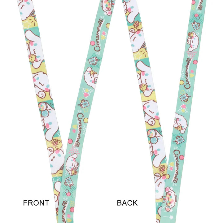 A front and back view of a Sanrio Cinnamoroll printed lanyard strap on a white background, showing the detailed cartoon pattern and the brand name 'Cinnamoroll' printed repeatedly.