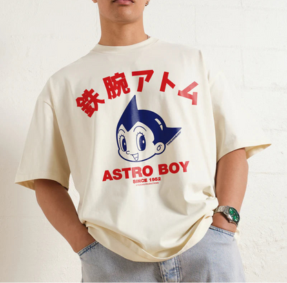 Person wearing Off white Natural Astro Boy Face Premium Oversized T-Shirt by Threadheads