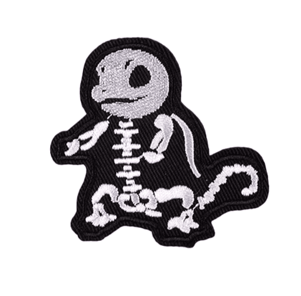 Embroidered patch of a skeleton pokemon squirtle on a white background