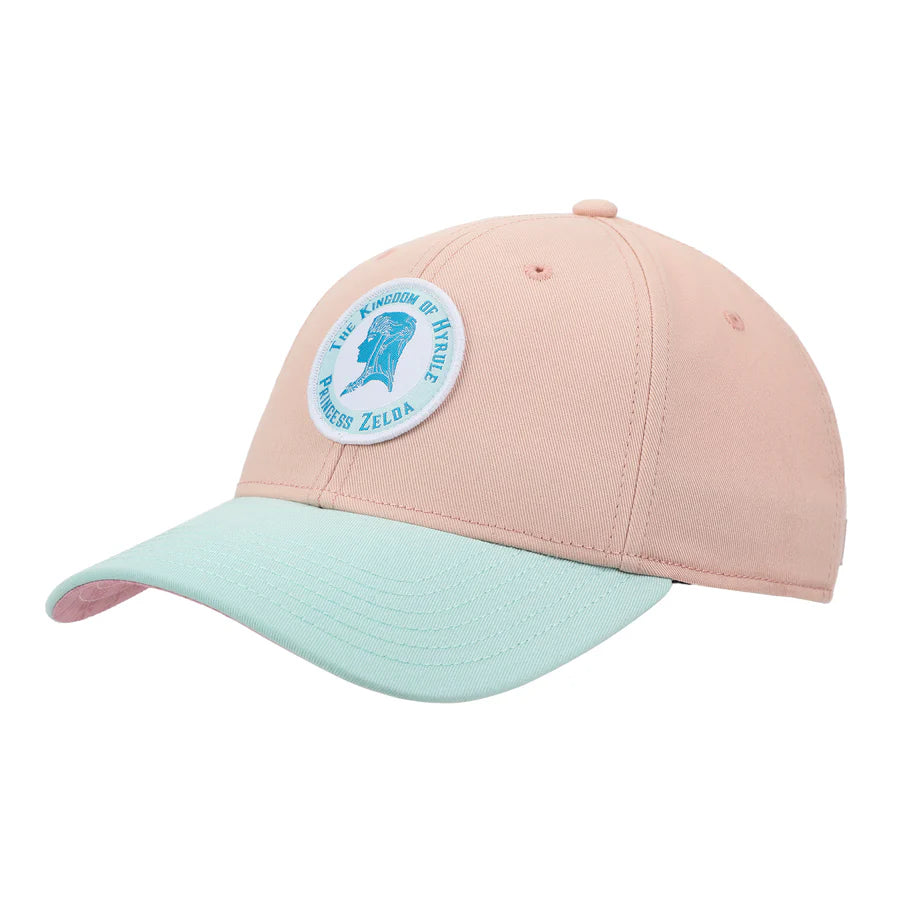 Pink and light blue cap with The Legend Of Zelda Princess Zelda Patch circular emblem on a white background