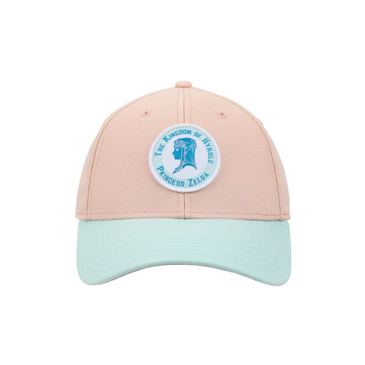 Pink and light blue cap with The Legend Of Zelda Princess Zelda Patch circular emblem on a white background