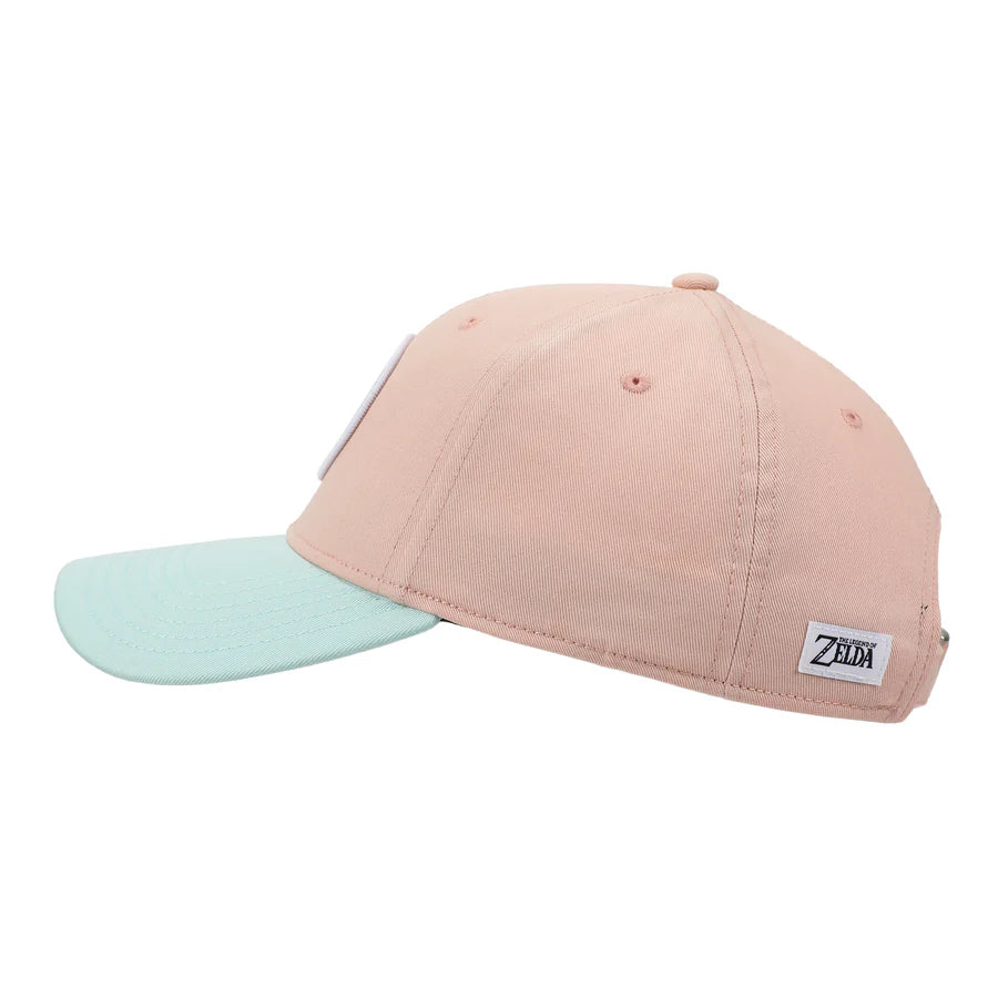 Pink and light blue cap with The Legend Of Zelda Princess Zelda Patch circular emblem on a white background