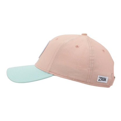 Pink and light blue cap with The Legend Of Zelda Princess Zelda Patch circular emblem on a white background