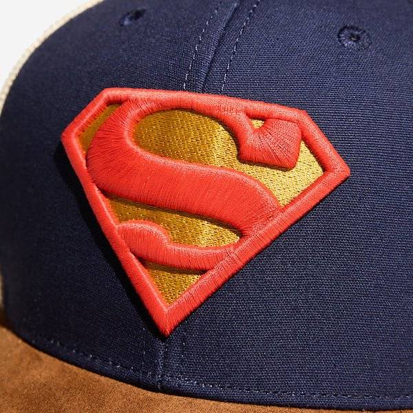 Superman logo cap with navy blue, beige, and brown colors on a white background dc comics Superman S-Shield Logo Canvas Trucker Hat available at chimploot.com