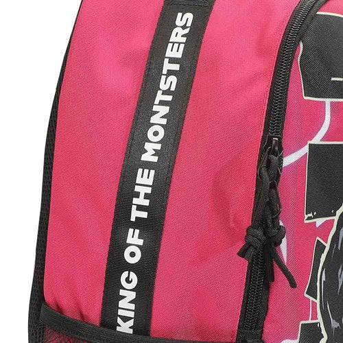 Backpack with a graphic design Godzilla king of the monsters and text on a pink and black background