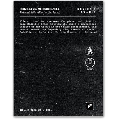 Vintage-style promotional card for 'Godzilla vs. Mechagodzilla' with text and logos on a black background.