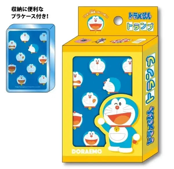Doraemon-themed blue card case shown with its yellow retail box. The box features Doraemon artwork and Japanese text, and a smaller inset shows the blue case with multiple character prints.