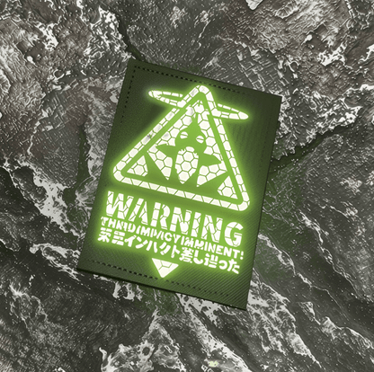 Black patch with green Evangelion Third Impact Reflective Hook & Loop Patch warning symbol and text on a white background