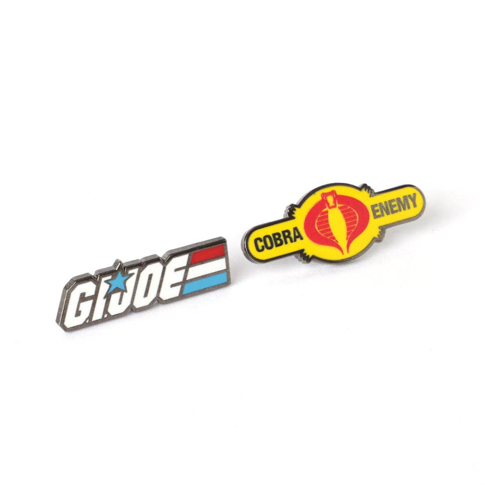 Two enamel pins on a white background: a metallic silver and blue G.I. Joe Cobra Logos Pin Set