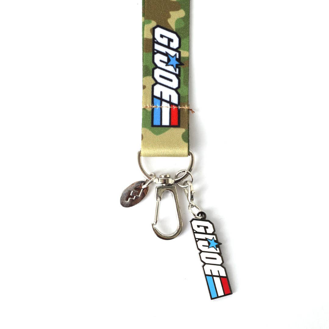 Officially licensed G.I. Joe lanyard featuring two collectible metal charms, a durable 20" polyester strap, and classic 1980s-inspired designs for fans and collectors.