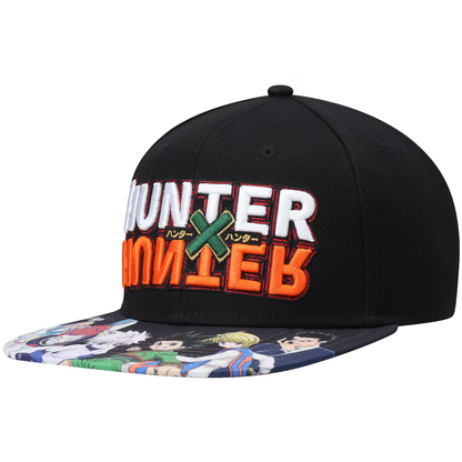 A black snapback cap featuring 'HUNTER x HUNTER' embroidered on the front in white, orange, and green, with a colorful anime character print on the brim.