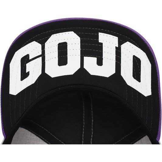 Close-up of a black baseball cap with large white 'GOJO' lettering on the front panel and a purple stitched edge.