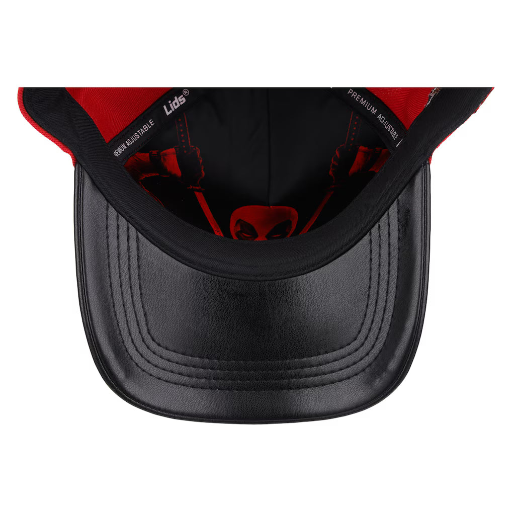 Close-up top-down view of a black baseball cap with red interior lining and a red Deadpool logo on the inside crown, shown on a white background.