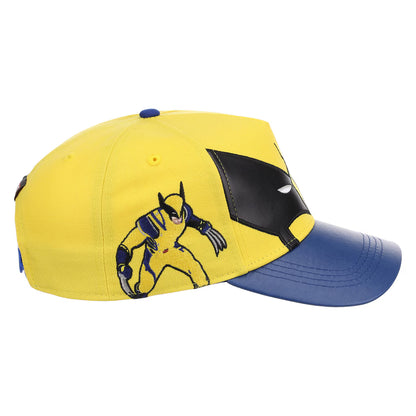 A yellow and blue baseball cap featuring a x-men wolverine black mask design on the front, resembling a superhero wolverine character, shown against a plain white background.