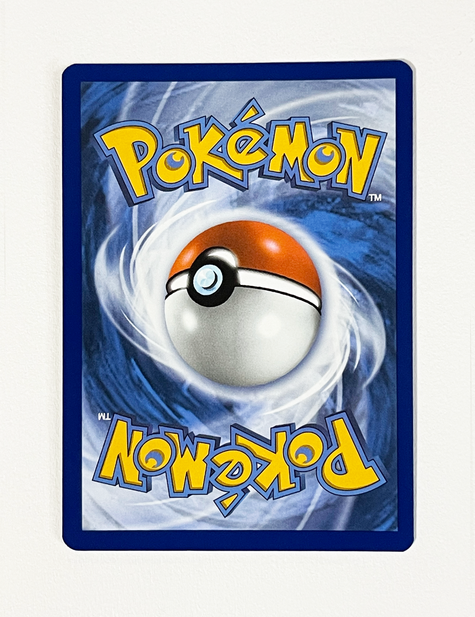 Pokémon trading card with a Poké Ball design on a blue and white background