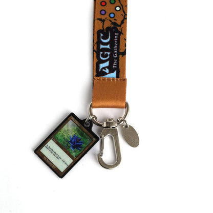 Lanyard with keychain and card holder featuring 'Magic: The Gathering' branding on a white background.