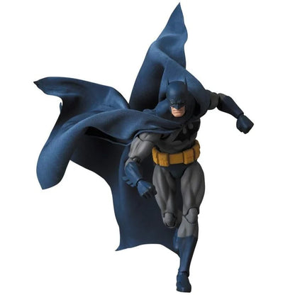 Batman figure in a dynamic pose with cape flowing