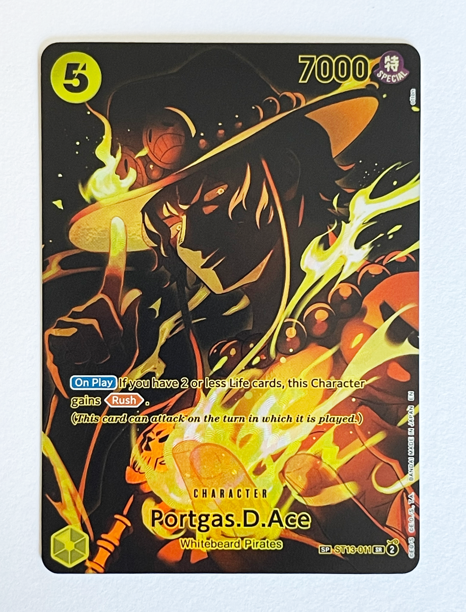 Card featuring Portgas D. Ace from One Piece with fiery design and character illustration.