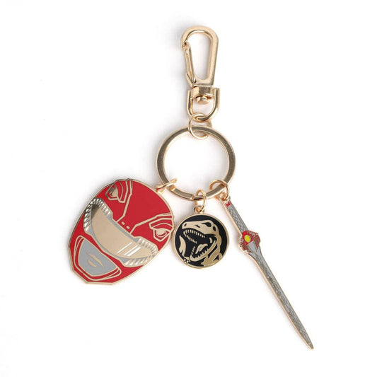 A gold-tone metal keychain featuring three Power rangers red ranger charms: a red and silver Power Ranger helmet, a black and gold dinosaur head, and a silver sword with a red gem accent, all attached to a split key ring on a white background.