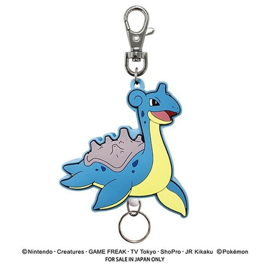 A blue and yellow Lapras pokemon character keychain charm with a silver metal clasp and key ring, shown on a plain white background with copyright text below.
