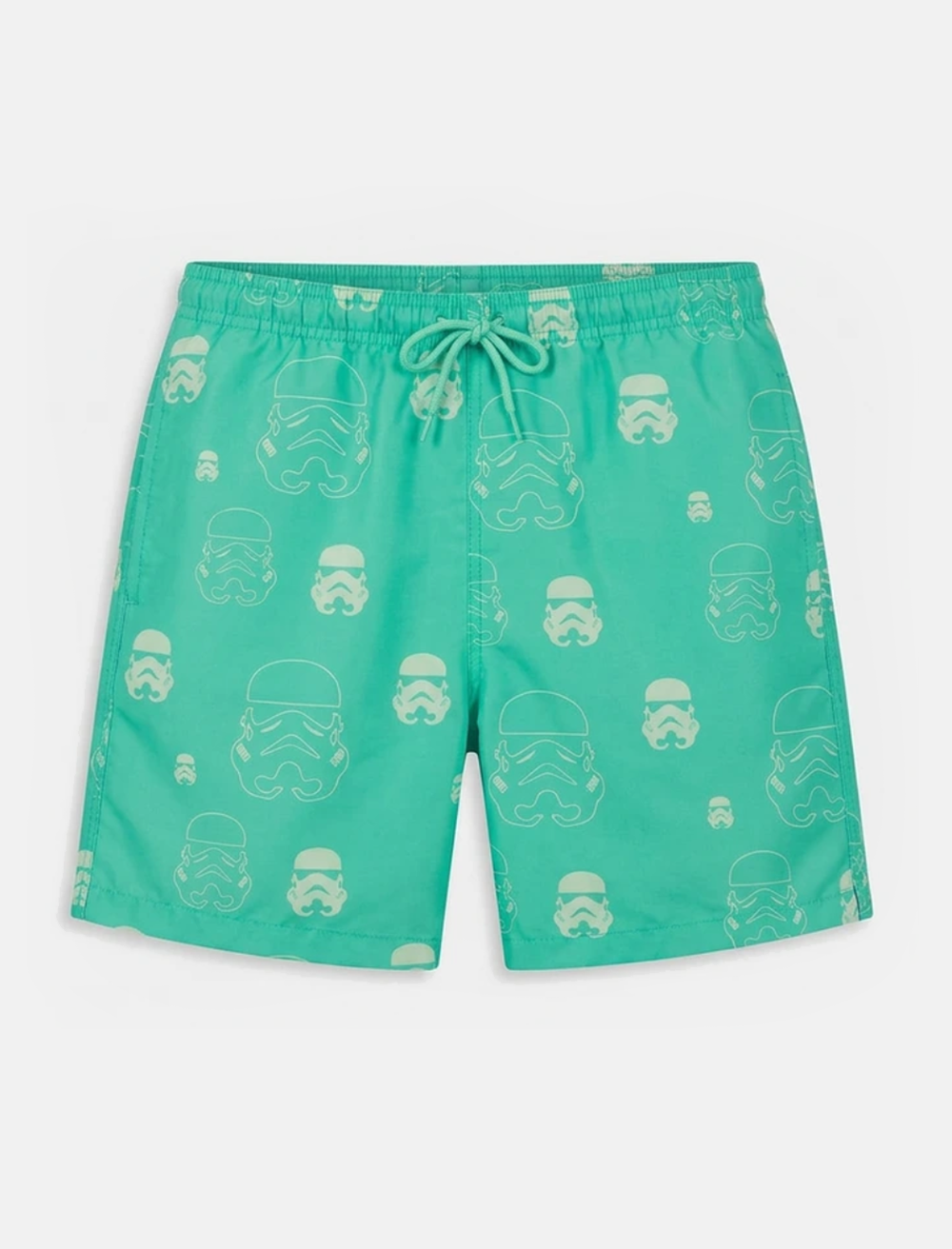 Green swim shorts with stormtrooper pattern on a white background