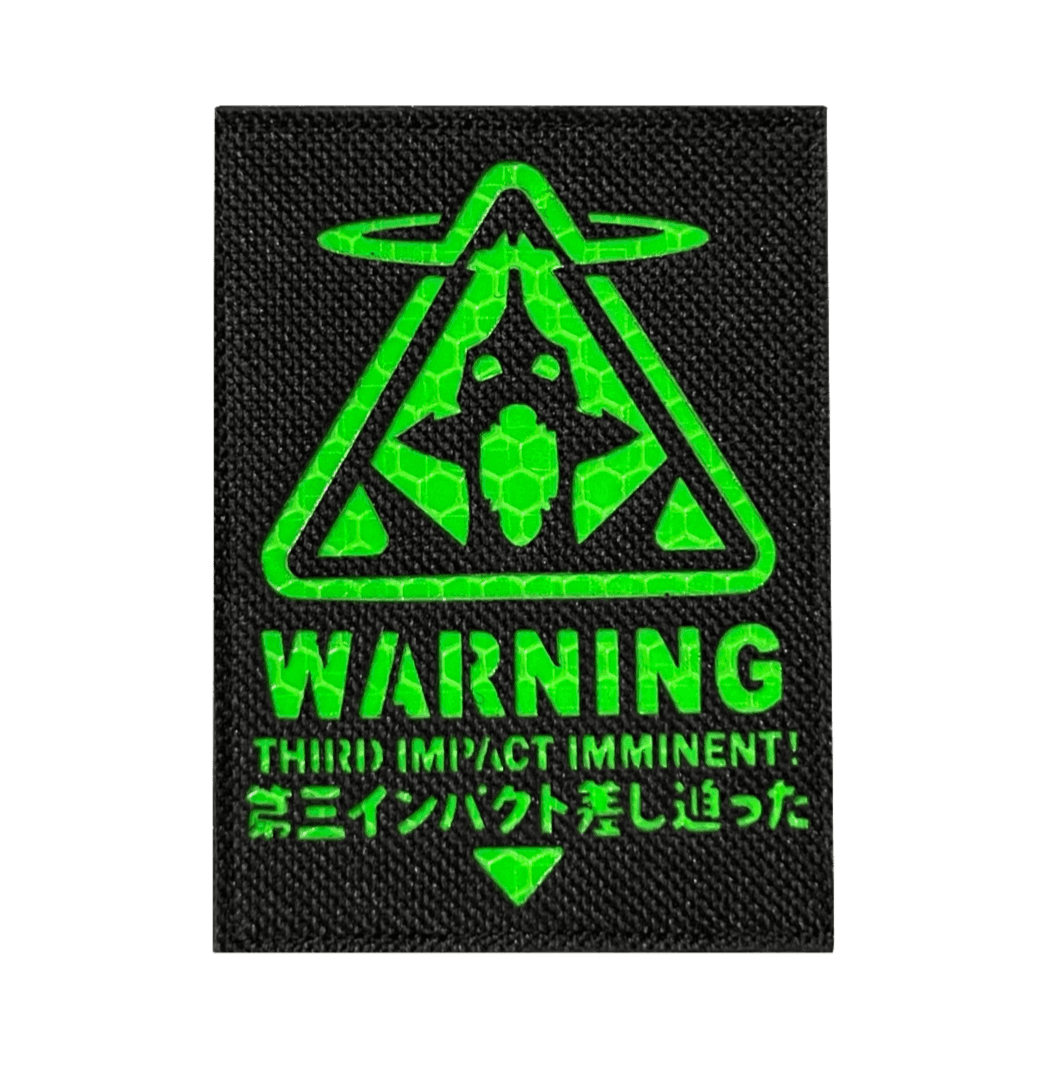 Black patch with green Evangelion Third Impact Reflective Hook & Loop Patch warning symbol and text on a white background